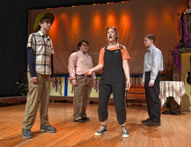 McCavery Burgess as Bill, Leo Vickery as Harry, Patrice Moriarty as Donna and Gus Musante as Sam rehearse for “Mamma Mia!” being put on by the Frontier Regional School theater program. 