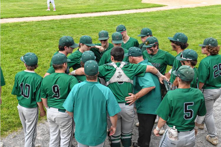 Greenfield huddles in between innings against Boston English during the Green Wave’s 2-0 loss in the MIAA Division 5 semifinal round on Tuesday at Assumption University in Worcester.