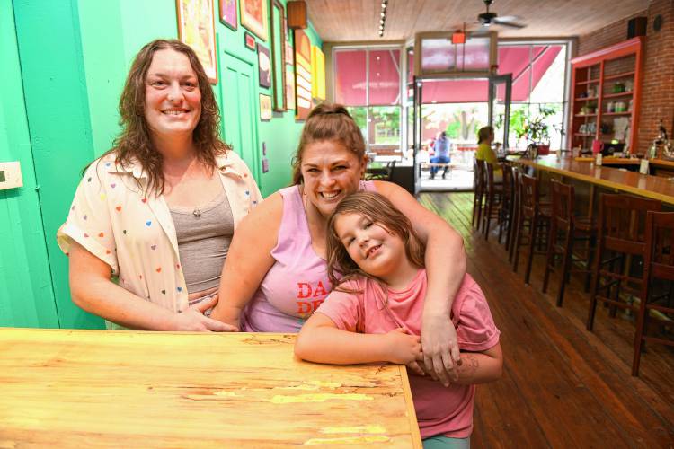 Adrian Catao and Jill Fishman with their daughter Rory Catao, 7½, at Dreamhouse restaurant on Third Street in Turners Falls.