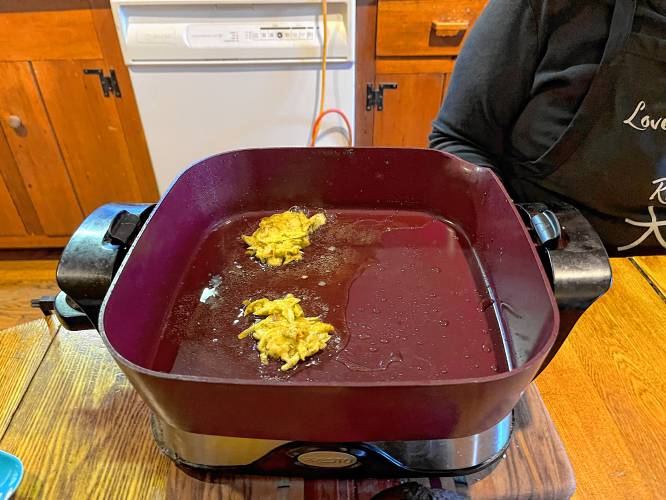 The latkes should be a little ragged. If they don’t hold together and are hard to turn, however, add a little more flour to the batter and/or even another egg. Fry the latkes a few at a time, turning each when the first side browns and is easy to flip.