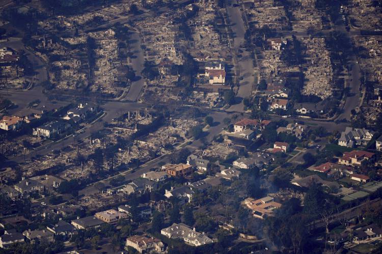 The devastation from the Palisades Fire is visible in the Pacific Palisades neighborhood of Los Angeles, Jan. 9, 2025.