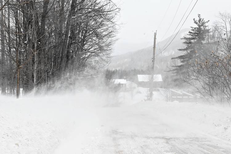 Blowing snow causes whiteout conditions on Pudding Hollow Road in Hawley on Monday. 