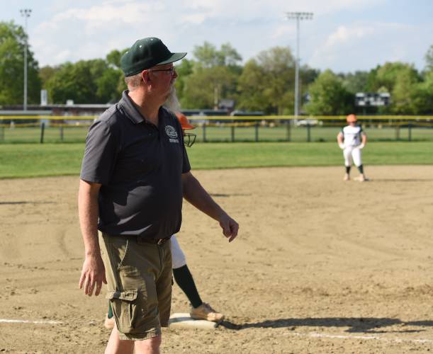 Greenfield head coach Ray Dodge looks on as his team has the bases loaded during the Green Wave’s 5-2 win over Agawam on Friday afternoon at Vets Field in Greenfield.