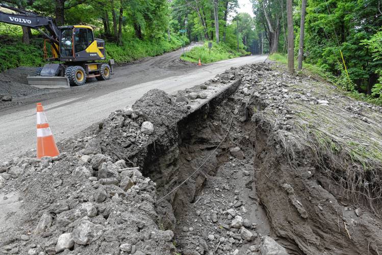 Erosion damage in Conway at Fields Hill Road and Whately Road, pictured in July 2023. Rescinding $1.5 million in borrowing authority for road repairs will be on the table for voters to consider at Saturday’s Annual Town Meeting, after the state granted Conway nearly $1.25 million in storm damage relief funding. Erosion damage in Conway at Fields Hill Road and Whately Road, pictured in July 2023. Rescinding $1.5 million in borrowing authority for road repairs will be on the table for voters to consider at Saturday’s Annual Town Meeting, after the state granted Conway nearly $1.25 million in storm damage relief funding.