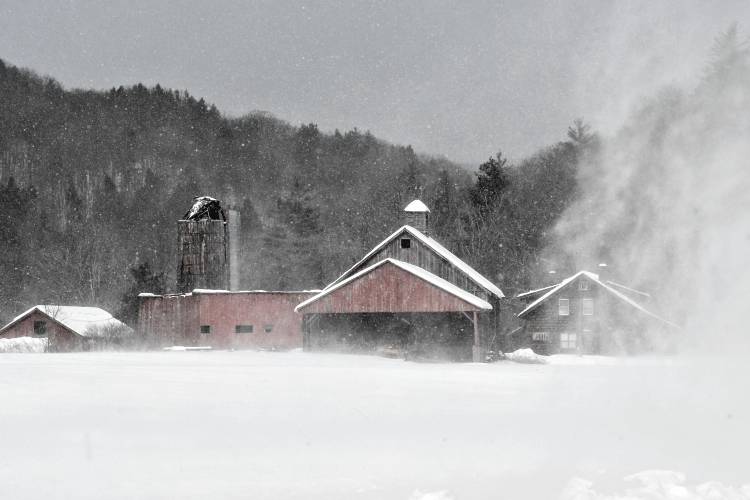 High winds whip snow across this farm field in Hawley on Monday.