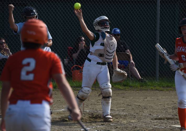 Greenfield’s Madison Lemay throws down to first base after a MacKenzie Paulin strikeout during the Green Wave’s 5-2 win over Agawam on Friday afternoon at Vets Field in Greenfield.