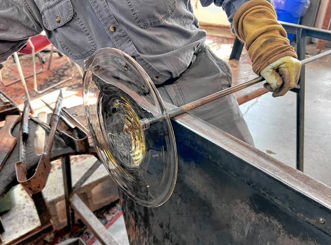 The last shaping of the glass before it is cooled.