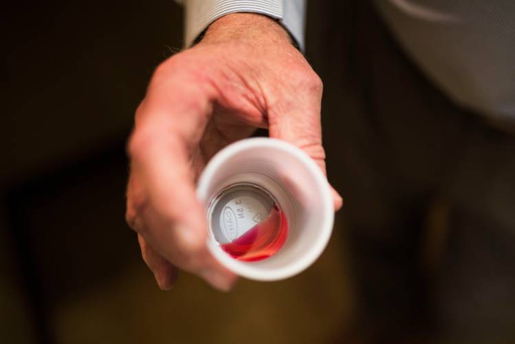 The CEO of a methadone clinic holds a 35 mg liquid dose of methadone in Rossville, Georgia, in this 2017 photo. The CEO of a methadone clinic holds a 35 mg liquid dose of methadone in Rossville, Georgia, in this 2017 photo.