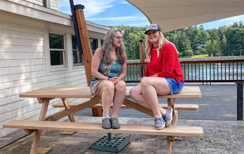 Ashfield resident Gretchen Gerstner, right, is now running the Ashfield Lake House in partnership with Gary Bogoff, founder of Berkshire Brewing Co. in South Deerfield. Amanda Nash, a Northampton real estate investor, left, is the new owner of the property.