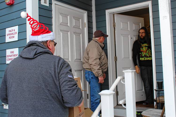 Greenfield Elks Lodge members assembled and delivered 50 Christmas meal boxes to residents in need on Saturday morning.