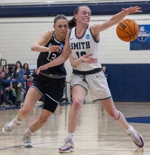 Amherst guard Laura Mendell, left, and Smith guard Maggie Fleming, right, compete for the ball during the NCAA Division 3 Women's Basketball tournament Round of 32 game at Ainsworth Gym, Saturday, March 8, 2025, in Northampton.