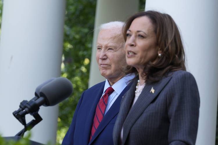 President Joe Biden listens as Vice President Kamala Harris speaks in the Rose Garden of the White House in Washington D.C. on May 13. With Biden ending his reelection bid and endorsing Harris, Democrats now must navigate a shift that is unprecedented this late in an election year. Democrats are set to hold their convention in Chicago in August.