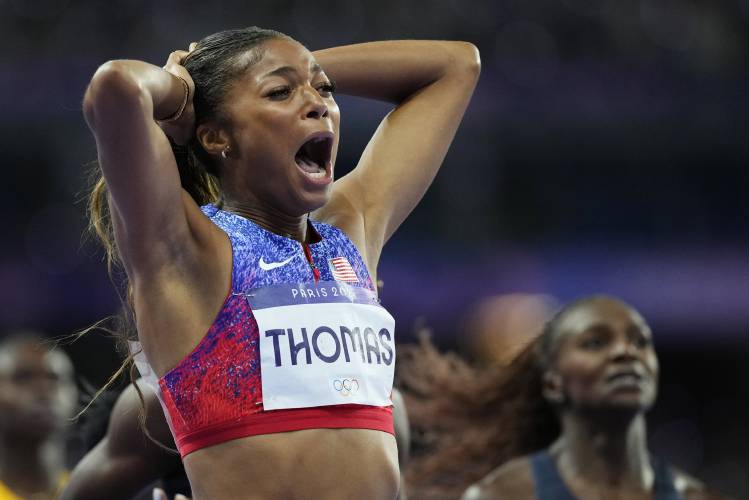 Florence’s Gabby Thomas reacts after winning the women's 200-meters final at the 2024 Summer Olympics, Tuesday, Aug. 6, 2024, in Saint-Denis, France.