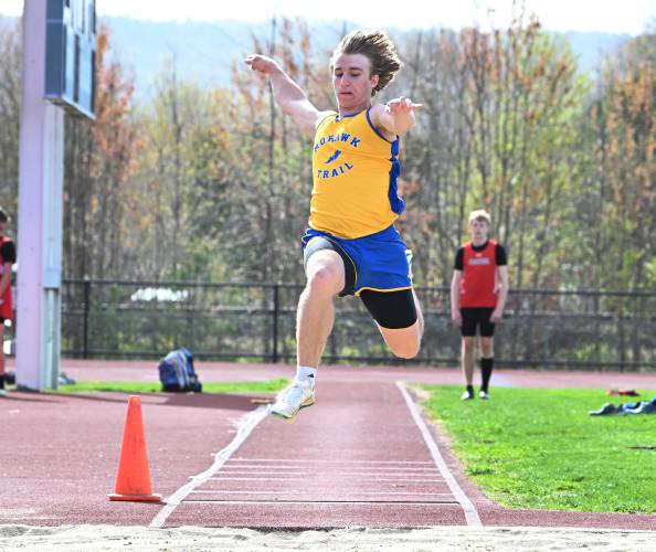Mohawk Trail’s Tanner Biagini competes in the long jump in South Deerfield on Tuesday. 