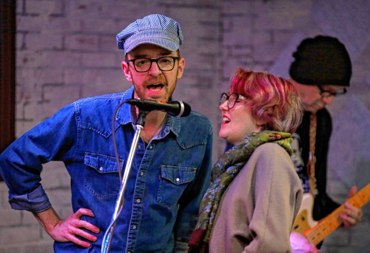 Nick Deysher, from left, Amy Wilkinson and Scot Lawson Pomeroy perform during a recent open mic night at JJ’s Tavern in Florence.