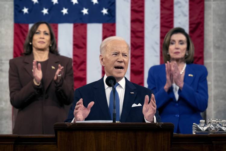 FILE - President Joe Biden delivers his State of the Union address to a joint session of Congress at the Capitol, March 1, 2022, in Washington. President Joe Biden dropped out of the 2024 race for the White House on Sunday, July 21, ending his bid for reelection following a disastrous debate with Donald Trump that raised doubts about his fitness for office just four months before the election. (Saul Loeb, Pool via AP, File)