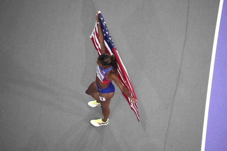 Florence’s Gabby Thomas celebrates after winning the women's 200-meter final at the 2024 Summer Olympics, Tuesday, Aug. 6, 2024, in Saint-Denis, France.