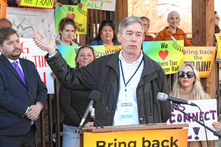 Ben Heckscher of Trains in the Valley speaks at a Northern Tier Passenger Rail service press conference at the John W. Olver Transportation Center in Greenfield.