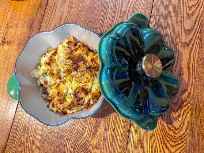You may eat the Colcannon as is with the rest of the butter melted on top. Or you may preheat the oven to 325 degrees and spread the Colcannon in a deep casserole dish. Roughly flatten the top, dot the remaining butter on top, and sprinkle paprika overall. Draw little cross hairs on top just before baking.