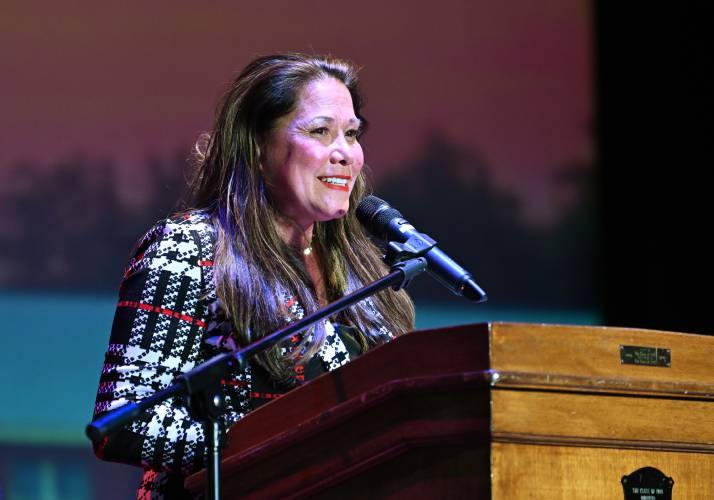 Keynote Speaker Robin Allain-Moody speaks at commencement exercises at Ralph C. Mahar Regional School Friday evening.