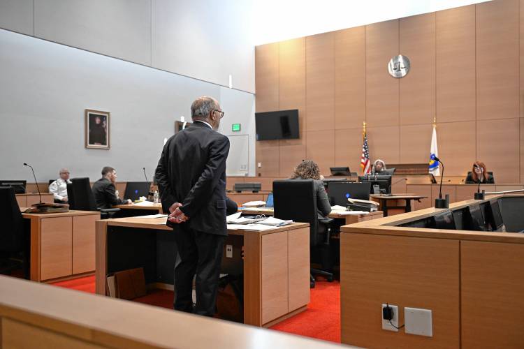 Javery Hattat, seated at left, with his defense attorney R. David DeHerdt addressing expert witness Dr. Emily Clionsky in Franklin County Superior Court on Monday.