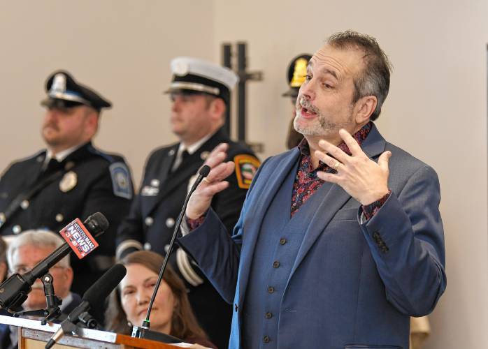 Emcee Dan Guin, outgoing City Council president, welcomes those in attendance at the John Zon Community Center for the new mayor’s inauguration ceremony and oath of office.