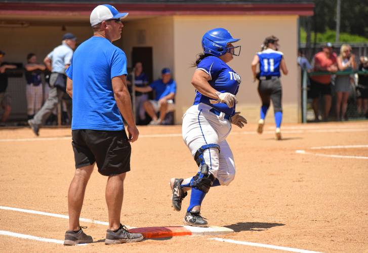 Turners Falls’ Holly Myers rounds first base after recording a hit during the Thunder’s 5-0 win over Georgetown in the MIAA Division 5 championship game on Saturday at Sortino Field on the campus of UMass.
