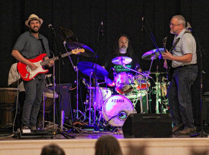 Adam S.Z. & The Inner Fiyah performs at the Orange Town Hall during Starry Starry Night on New Year’s Eve.
