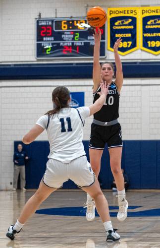Amherst guard Anna Tranum (10) attempts a three-point shot during the NCAA Division 3 Women's Basketball tournament Round of 32 game against Smith at Ainsworth Gym, Saturday, March 8, 2025, in Northampton.