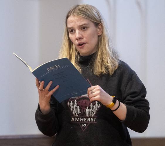 UMass junior Ashley Schneider sings during rehearsal for 2025 UMass Bach Festival and Symposium, which will take place April 25-27.