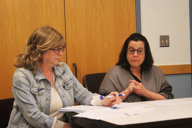 Michele Tontodonato, left, director of finance and operations of the Ralph C. Mahar Regional and Union 73 school districts, and Superintendent Elizabeth Zielinski, spoke at a Wendell Selectboard meeting on Wednesday.