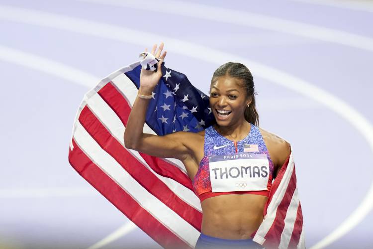 Florence’s Gabby Thomas celebrates after winning the women's 200-meters final at the 2024 Summer Olympics, Tuesday, Aug. 6, 2024, in Saint-Denis, France.