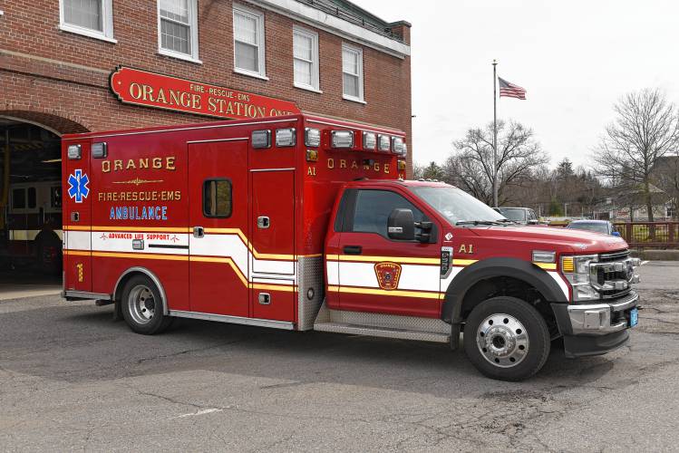 An Orange Fire Rescue EMS ambulance outside the Orange Fire Station. An Orange Fire Rescue EMS ambulance outside the Orange Fire Station.