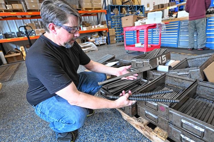 Jason Bradley, of Pilot Precision Products in South Deerfield, with hardened cutting tools produced from raw steel. Local businesses are bracing for the impact that steel and aluminum tariffs could have on their bottom line.