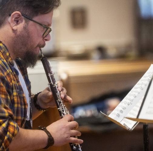 UMass alumnus Aaron Lakota plays the oboe during rehearsal for the 2025 UMass Bach Festival and Symposium.