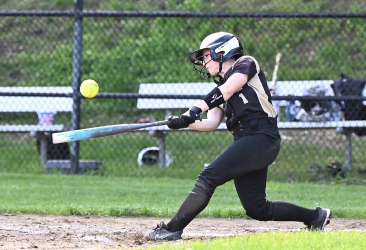 Pioneers Laylah Goulston makes contact vs Athol Northfield on Tuesday. 