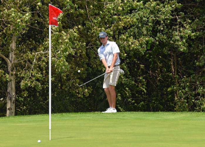 Sandy Burr Country Club’s Liam Gill watches his chip on the ninth green at Ledges Golf Club in South Hadley during the 43rd Massachusetts Amateur Public Links Golf Championship on Wednesday.