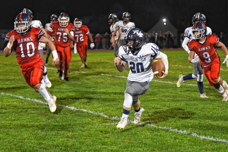 Franklin Tech’s Josiah Little carries the ball  against Frontier in South Deerfield Friday night. 