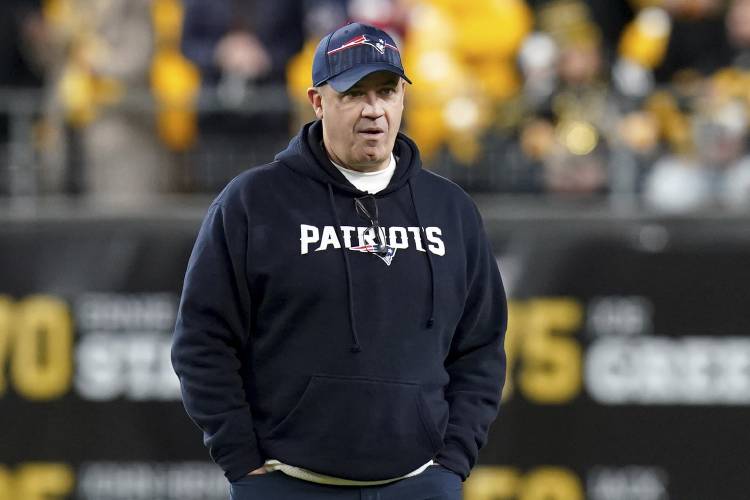 FILE - New England Patriots offensive coordinator Bill O'Brien watches warmups for the team's NFL football game against the Pittsburgh Steelers on Dec. 7, 2023, in Pittsburgh. Ohio State is hiring O'Brien as its offensive coordinator, a person with direct knowledge of the decision told The Associated Press on Thursday night, Jan. 18, 2024. The person spoke on condition of anonymity because the hire still needed university approval, but an announcement was expected as soon as...