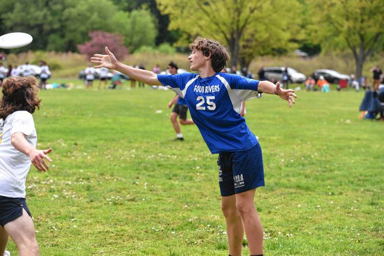 Four Rivers’ Henry Schwerin makes a pass against PVPA in the Four Rivers Ultimate Tournament in Greenfield Saturday.