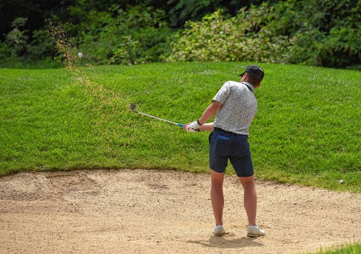 Palmer’s Ethan Beauchemin hits out of the greenside bunker on the 16th hole at Ledges Golf Club in South Hadley during the 43rd Massachusetts Amateur Public Links Golf Championship on Wednesday. 
