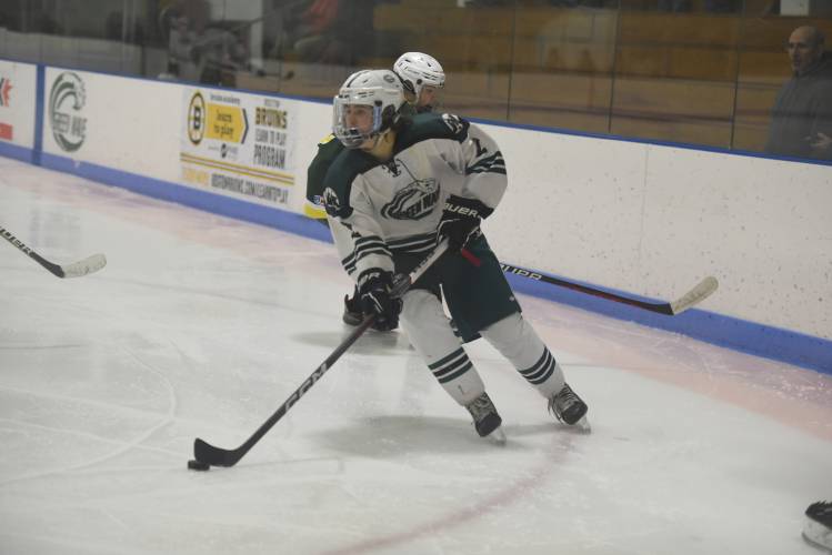 Greenfield's Jake Jurek drives the puck to the net against Southwick on Monday at Collins-Moylan. 
