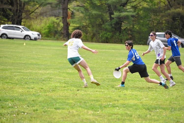 Four Rivers’ Logan Blais looks to make a pass against PVPA in the Four Rivers Ultimate Tournament in Greenfield Saturday.