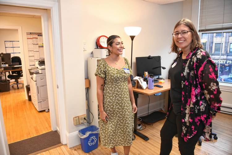Marketing and Communications Coordinator Ravin Graves and Assistant Director Margaret Anderson of The Literacy Project in the nonprofit’s new location at 278 Main St., Suite 202, in Greenfield. An open house was held Monday night.