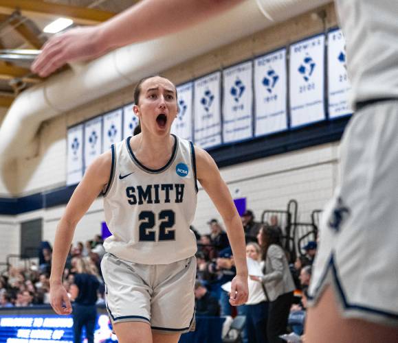 Smith guard Hannah Martin celebrates a play with a teammate during the NCAA Division 3 Women's Basketball tournament Round of 32 game against Amherst at Ainsworth Gym, Saturday, March 8, 2025, in Northampton.