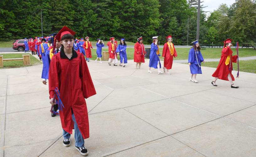 Seniors file into commencement exercises at Ralph C. Mahar Regional School Friday evening.