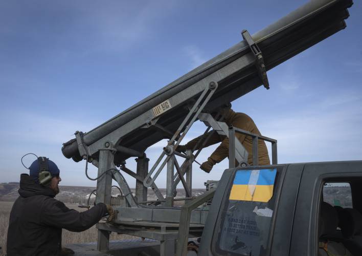Ukrainian soldiers from The 56th Separate Motorized Infantry Mariupol Brigade prepare to fire a multiple launch rocket system based on a pickup truck towards Russian positions at the front line, near Bakhmut, Donetsk region, Ukraine, Tuesday, March 5, 2024. Ukrainian soldiers from The 56th Separate Motorized Infantry Mariupol Brigade prepare to fire a multiple launch rocket system based on a pickup truck towards Russian positions at the front line, near Bakhmut, Donetsk region, Ukraine, Tuesday, March 5, 2024.