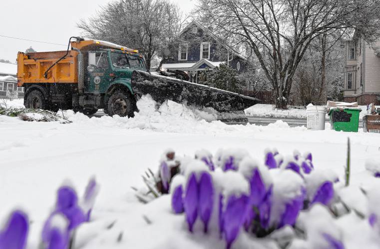 The Greenfield Department of Public Works was out plowing wet, slushy snow off Greenfield’s streets on Thursday morning.