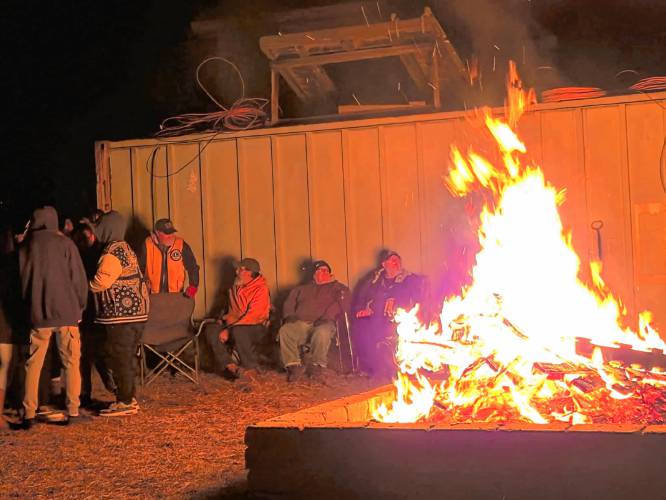 The bonfire behind the Fire Station was a popular attraction during Starry Starry Night in Orange on New Year’s Eve.