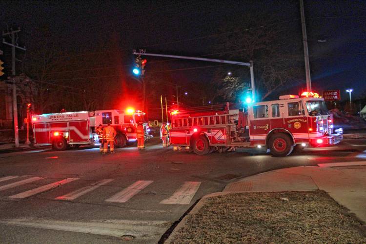 Police and firefighters respond to a bomb threat at the Walgreens on Avenue A in Turners Falls Monday night. 